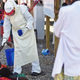 A health worker wearing protective equipment assists an Ebola patient at the Kenema, Sierra Leone, treatment center run by the Red Cross Society Nov. 15, 2014.
FRANCISCO LEONG/AFP/Getty Images
